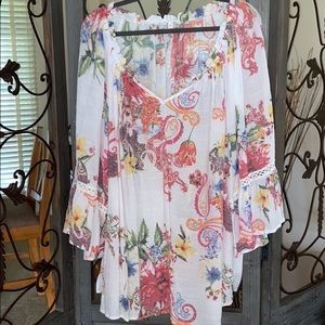 Plus size 3x 3/4 bell sleeve blouse vneck.